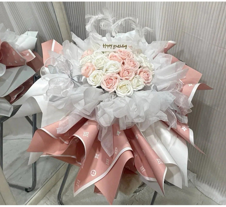 Valentine's floral paper pack featuring elegant red roses and romantic designs, perfect for crafting love-themed projects.