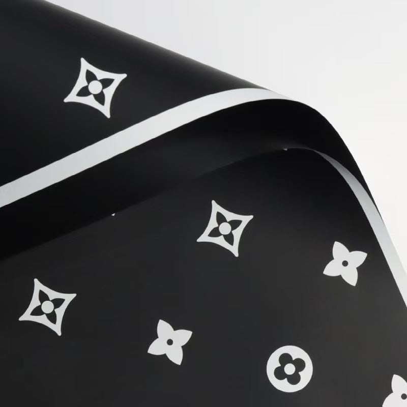 Valentine's floral paper pack featuring elegant red roses and romantic designs, perfect for crafting love-themed projects.