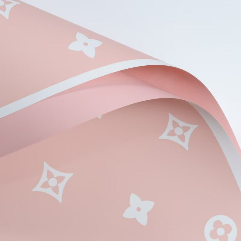 Valentine's floral paper pack featuring elegant red roses and romantic designs, perfect for crafting love-themed projects.