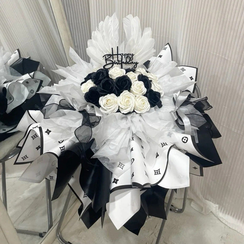 Valentine's floral paper pack featuring elegant red roses and romantic designs, perfect for crafting love-themed projects.