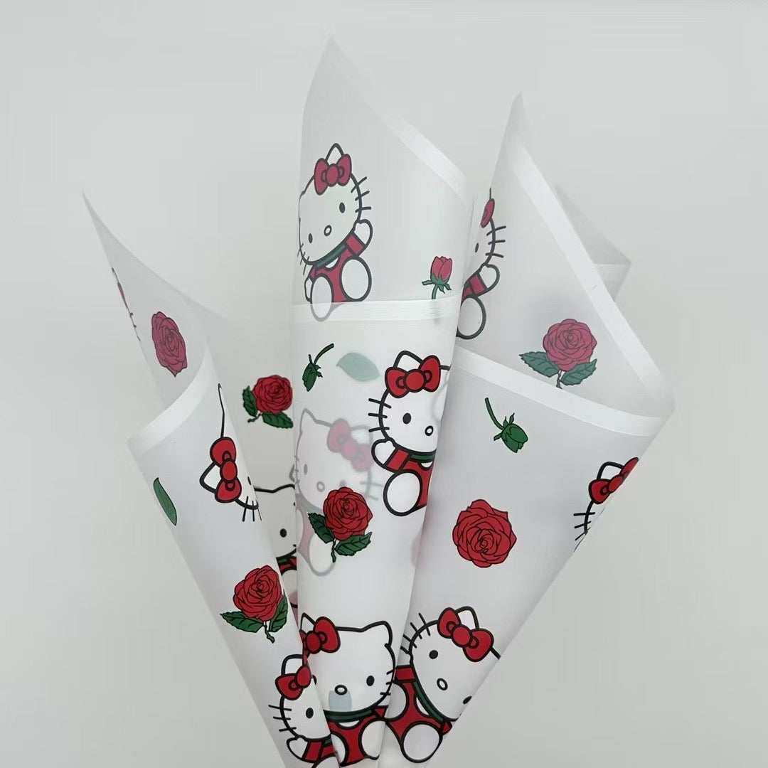 Elegant pink rose bouquet with Hello Kitty figurine, perfect for gifting and floral arrangements featuring characters.