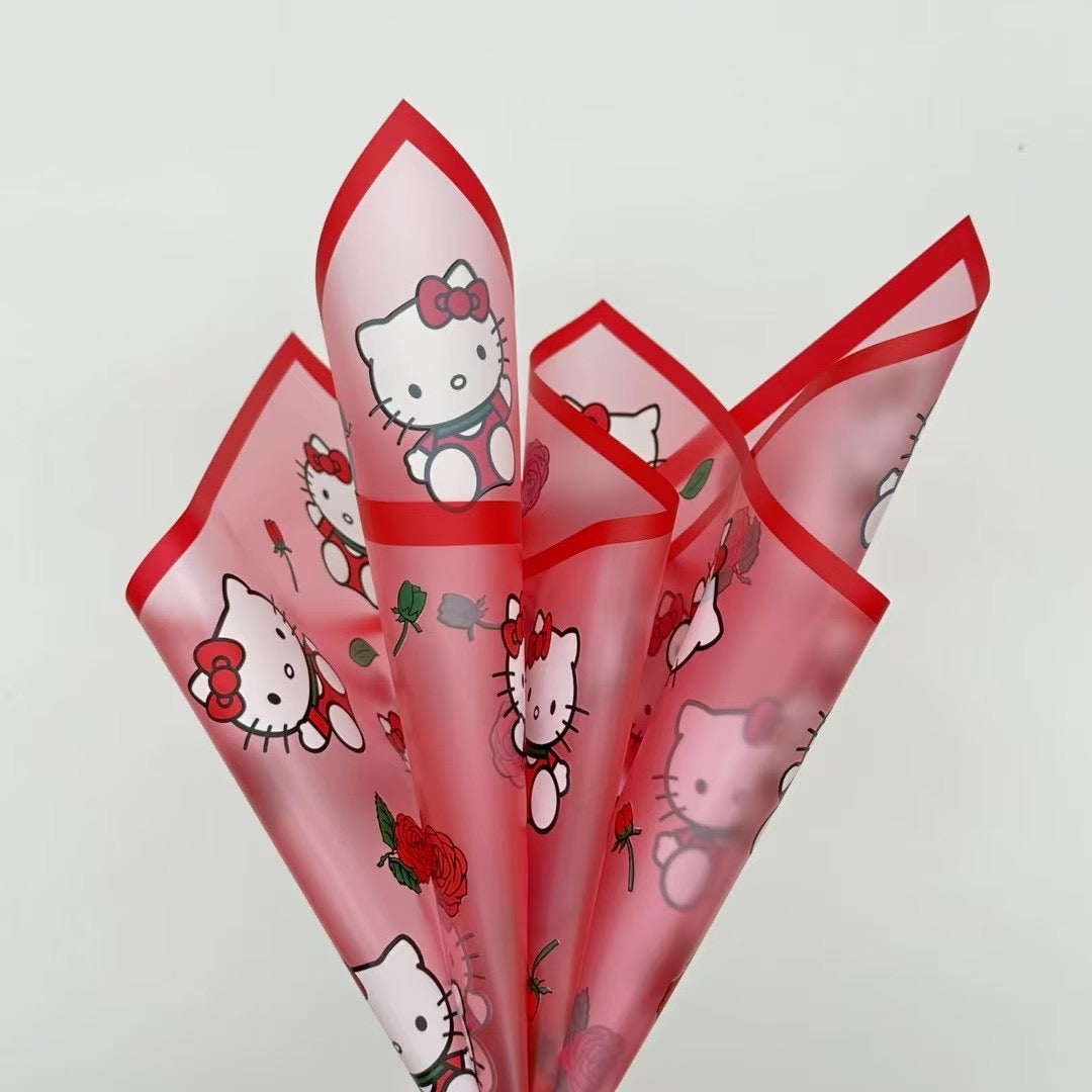 Elegant pink rose bouquet with Hello Kitty figurine, perfect for gifting and floral arrangements featuring characters.