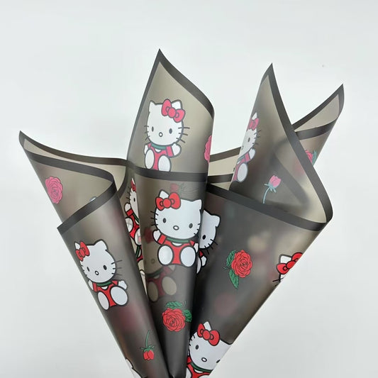 Elegant pink rose bouquet with Hello Kitty figurine, perfect for gifting and floral arrangements featuring characters.