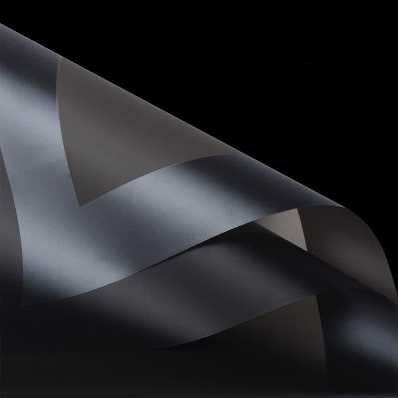 Elegant border flower design featured on premium wrapping paper for gift packaging and decoration purposes.