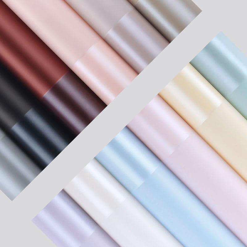 Elegant border flower design featured on premium wrapping paper for gift packaging and decoration purposes.